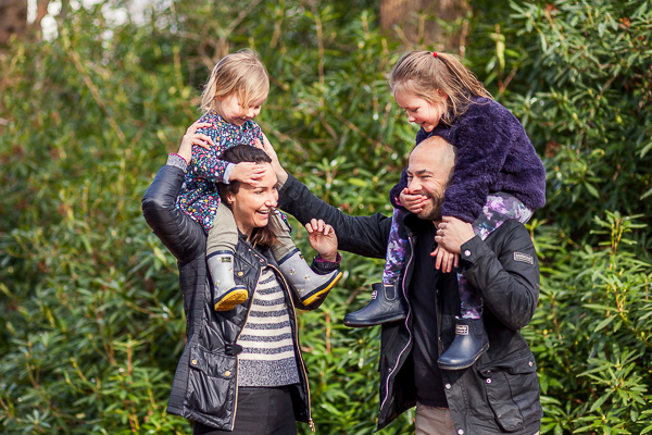 family wearing layered outfits during outdoor photoshoot in Hampshire